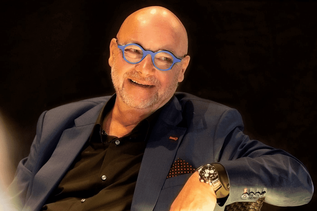 Lasse norres hymyilee arkistokuvassa Kuva 2020